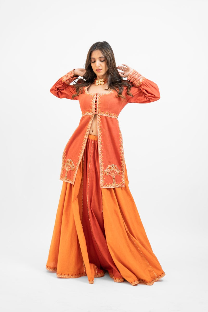 Rust orange embroidered panel top with skirt