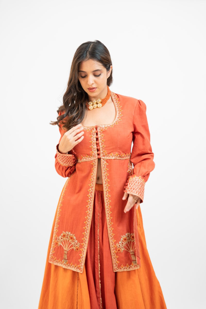 Rust orange embroidered panel top with skirt